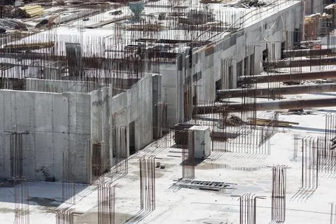 Construction of multi-storey building or shopping center in city. modern Stock Photos