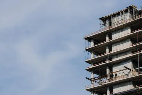 Construction of a multi-storey building. Place for your text Stock Photos