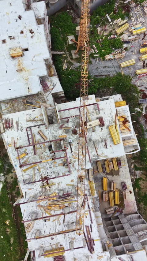 Construction of a multi-storey building in progress with visible tools, Stock Footage 337882198