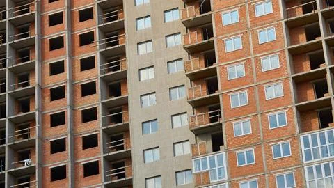 Construction of multi storey building.Residential multi apartment Stock Photos