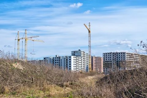 Construction of a multi-storey complex in an abandoned wasteland Stock Photos