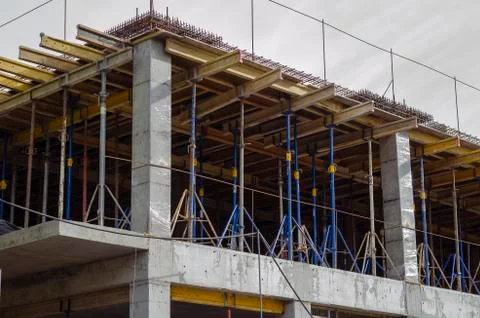 Construction of a multi-storey concrete monolithic building. Stock Photos