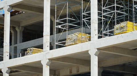 Construction of a multi-storey concrete monolithic building. Many support and Stock Photos