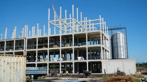 Construction of a multi-storey concrete monolithic building. Many support and Stock Photos