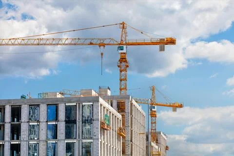 Construction of a multi-storey high-rise residential building using tower c.. Stock Photos