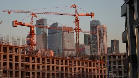 Construction of a multi-storey house at sunset Stock Footage 172296605