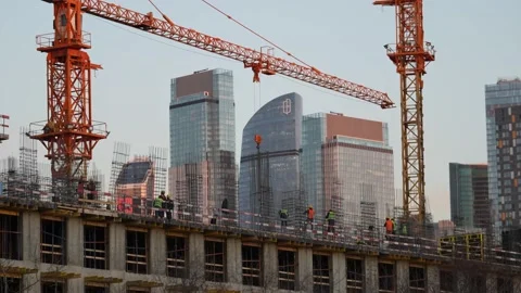 Construction of a multi-storey house at sunset_1 Stock Footage 172296604