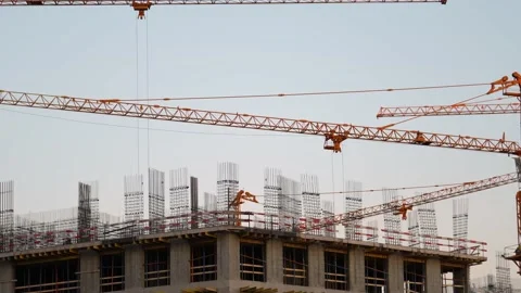 Construction of a multi-storey house at sunset_3 Stock Footage 172296608