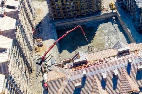 Construction of a multi-storey residential complex. Aerial view. Pouring conc Stock Photos