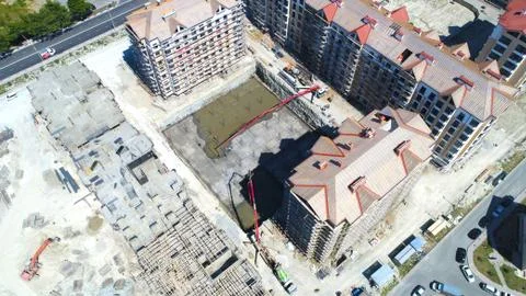 Construction of a multi-storey residential complex. Aerial view. Pouring conc Stock Photos