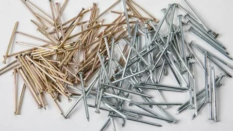 Construction nail stack on a white background Stock Photos