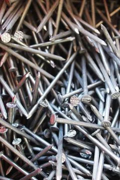 Construction nails close-up. Construction background Stock Photos