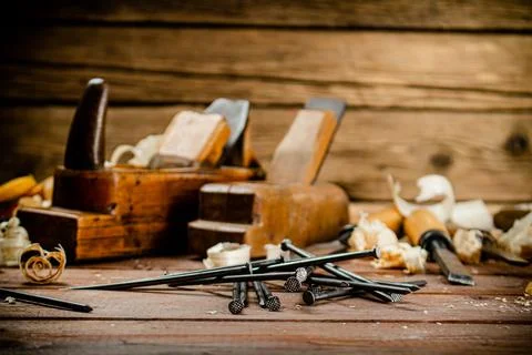 Construction nails on the table. Stock Photos