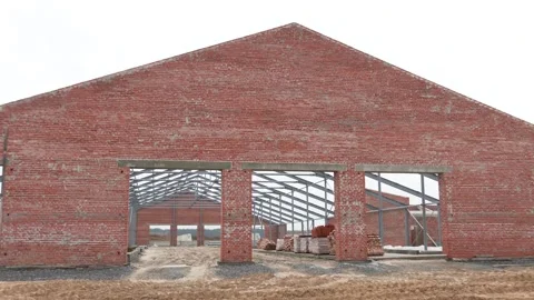 The construction of the new barn. Technologies in construction. Stock-Footage 165637239