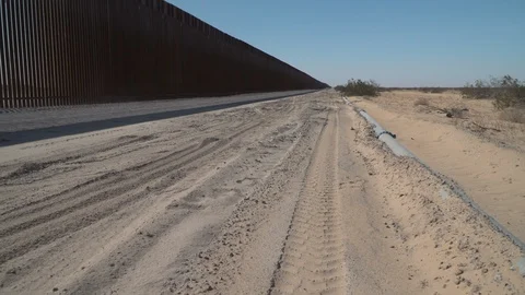 Construction of new border wall is underway on the US-Mexico border. Stock Footage 122111187