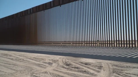 Construction of new border wall is underway on the US-Mexico border. Stock Footage 122111559