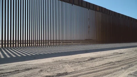 Construction of new border wall is underway on the US-Mexico border. Stock Footage 122112179