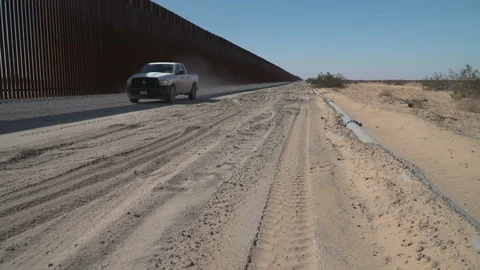 Construction of new border wall is underway on the US-Mexico border. Stock Footage 122113532
