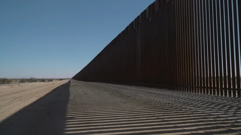 Construction of new border wall is underway on the US-Mexico border. Stock Footage 122114242