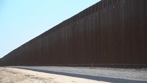 Construction of new border wall is underway on the US-Mexico border. Stock Footage 122115956