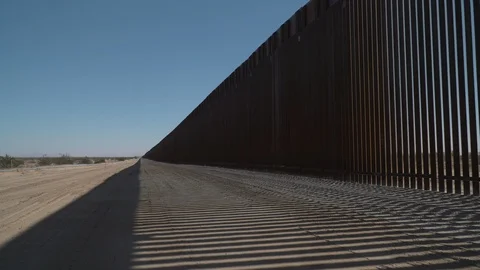 Construction of new border wall is underway on the US-Mexico border. Stock Footage 122116546