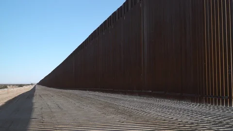 Construction of new border wall is underway on the US-Mexico border. Stock Footage 122116552