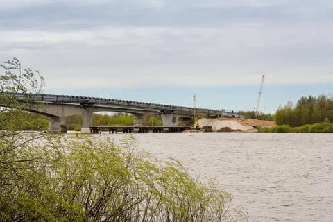 Construction of a new bridge next to the old one. Stock Photos