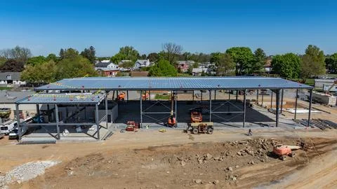 Construction of a New Building Structure in an Urban Area on a Clear Sunny Da Stock Photos