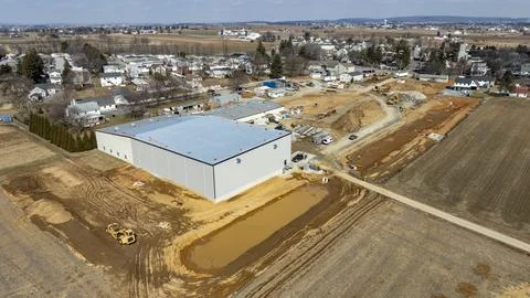 Construction of a New Facility in a Rural Area With Machinery and Land Cleari Stock Photos