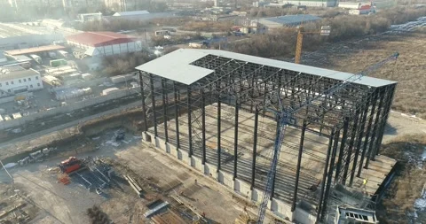The construction of a new factory workshop, top view. industrial exterior Stock-Footage 195119267