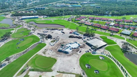 Construction of new golf course in sunny Florida. Development of premium Stock Footage 247425749