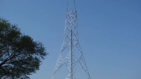 Construction of a new high-voltage electrical transmission tower Video stock 333451567