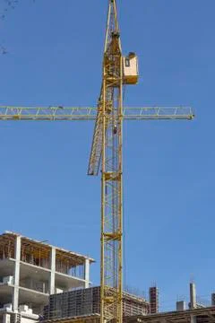 Construction. new house close-up.construction cranes at the construction site Stock Photos