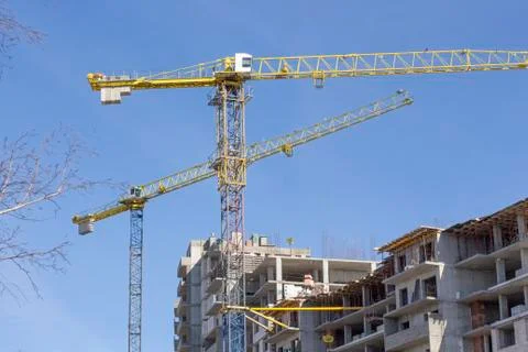Construction. new house close-up.construction cranes at the construction site Stock Photos