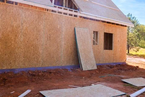 Construction of new house with OSB panels framing for new house structure Stock Photos
