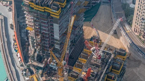 Construction of new modern skyscraper in Dubai city aerial timelapse, United Stock Footage 113830780