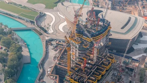 Construction of new modern skyscraper in Dubai city aerial timelapse, United Stock Footage 124462093