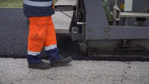 Construction of a new road. Asphalt paver. Stock-Footage 320256003