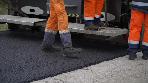 Construction of a new road. Asphalt paver. Video stock 320256408