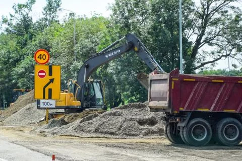 Construction of a new road. Heavy equipment on repair and construction of the Stock Photos