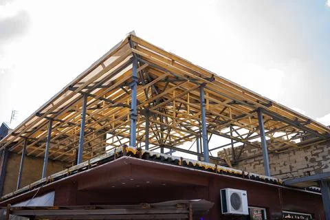 Construction of a new rooftop structure in an urban area Stock Photos