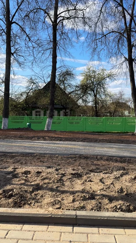 Construction of a new sidewalk next to the Green Park fence  Stock Footage 334628717
