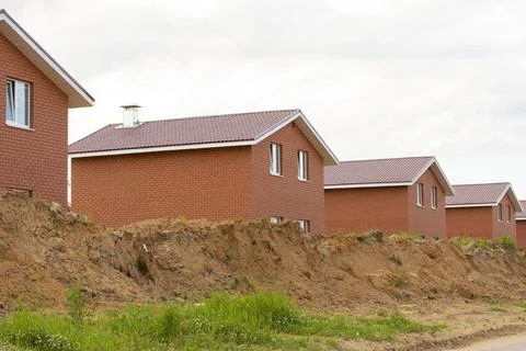 Construction of new two-storey brick houses. Stock Photos
