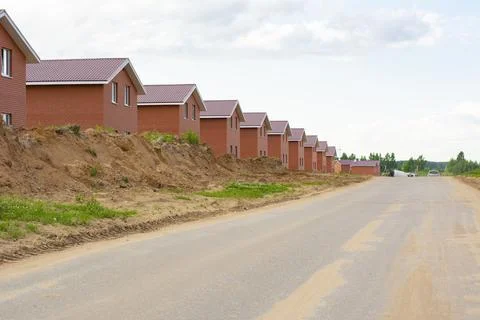 Construction of new two-storey brick houses. Stock Photos