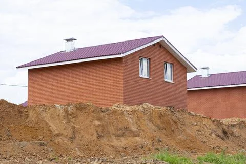 Construction of new two-storey brick houses. Stock Photos