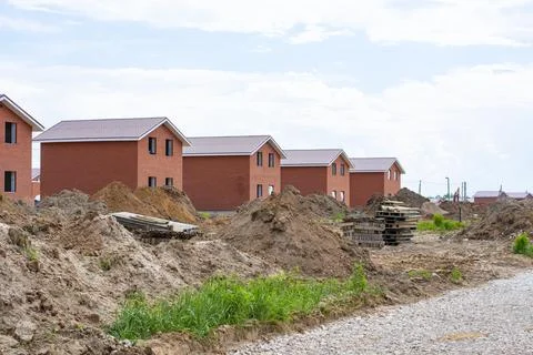 Construction of new two-storey brick houses. Stock Photos