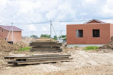 Construction of new two-storey brick houses. Urban-type settlement. Stock Photos