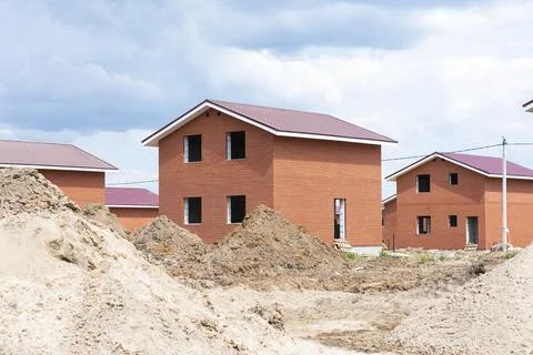 Construction of new two-storey brick houses. Urban-type settlement. Foto stock