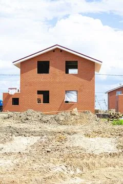 Construction of new two-storey brick houses. Urban-type settlement. Stock Photos