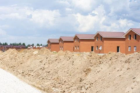Construction of new two-storey brick houses. Urban-type settlement. Stock Photos
